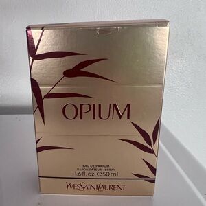 Yves Saint Laurent Opium Eau de Parfum in Gold and Red